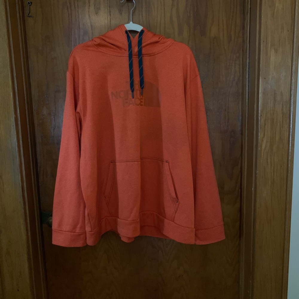 The North Face Orange Sweatshirt Vibrant and Cozy